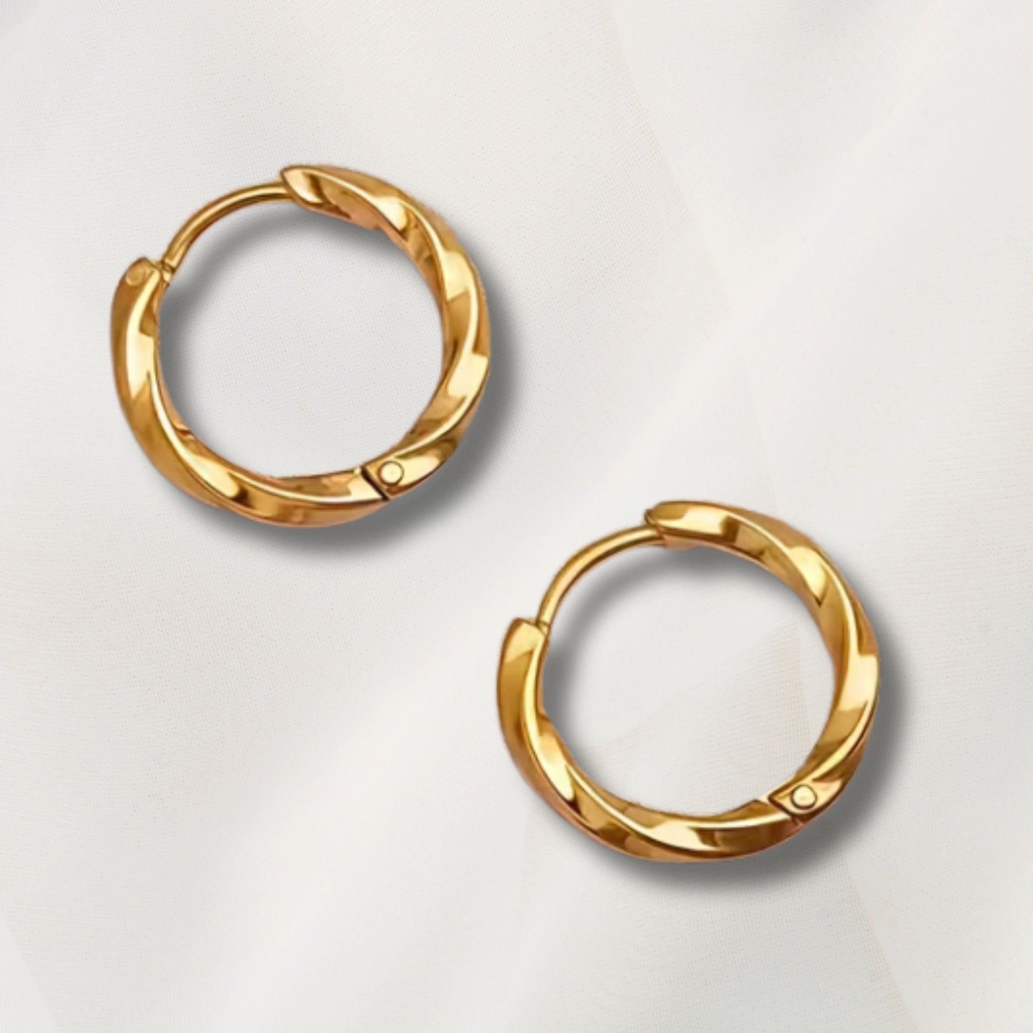 créoles torsadées en acier inoxydables dorées