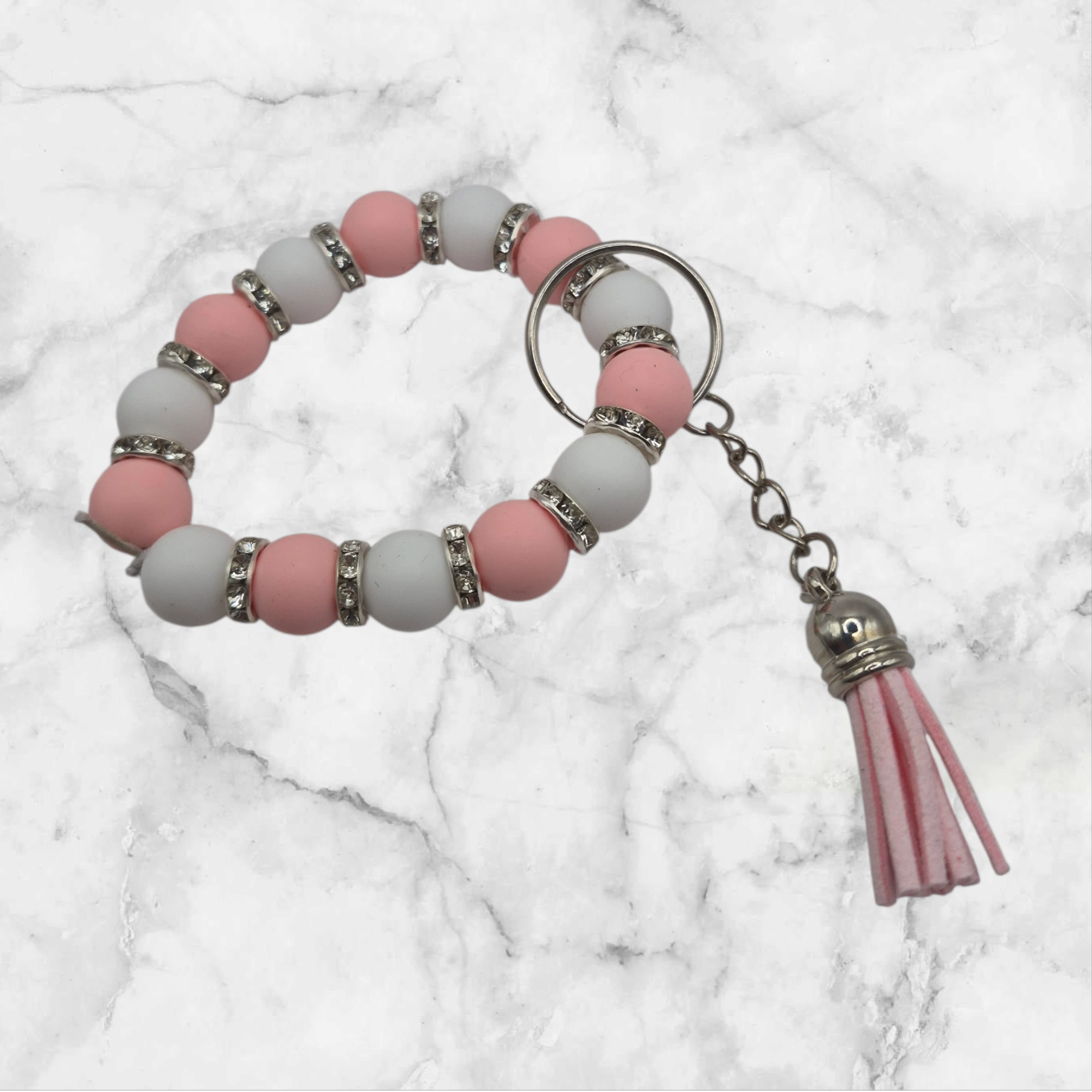 Porte-clés perles de silicone et petit pompon